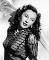 Click image for larger version

Name:	Barbara_Stanwyck_in_a_translucent_blouse.jpg
Views:	333
Size:	85.1 KB
ID:	88964