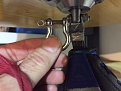 This is the LMF supplied shackle next to the smaller and  whole lot lighter and shorter swivel I'm now using with the Title Perilous(since it's real narrow will only work on bags with narrow loops)